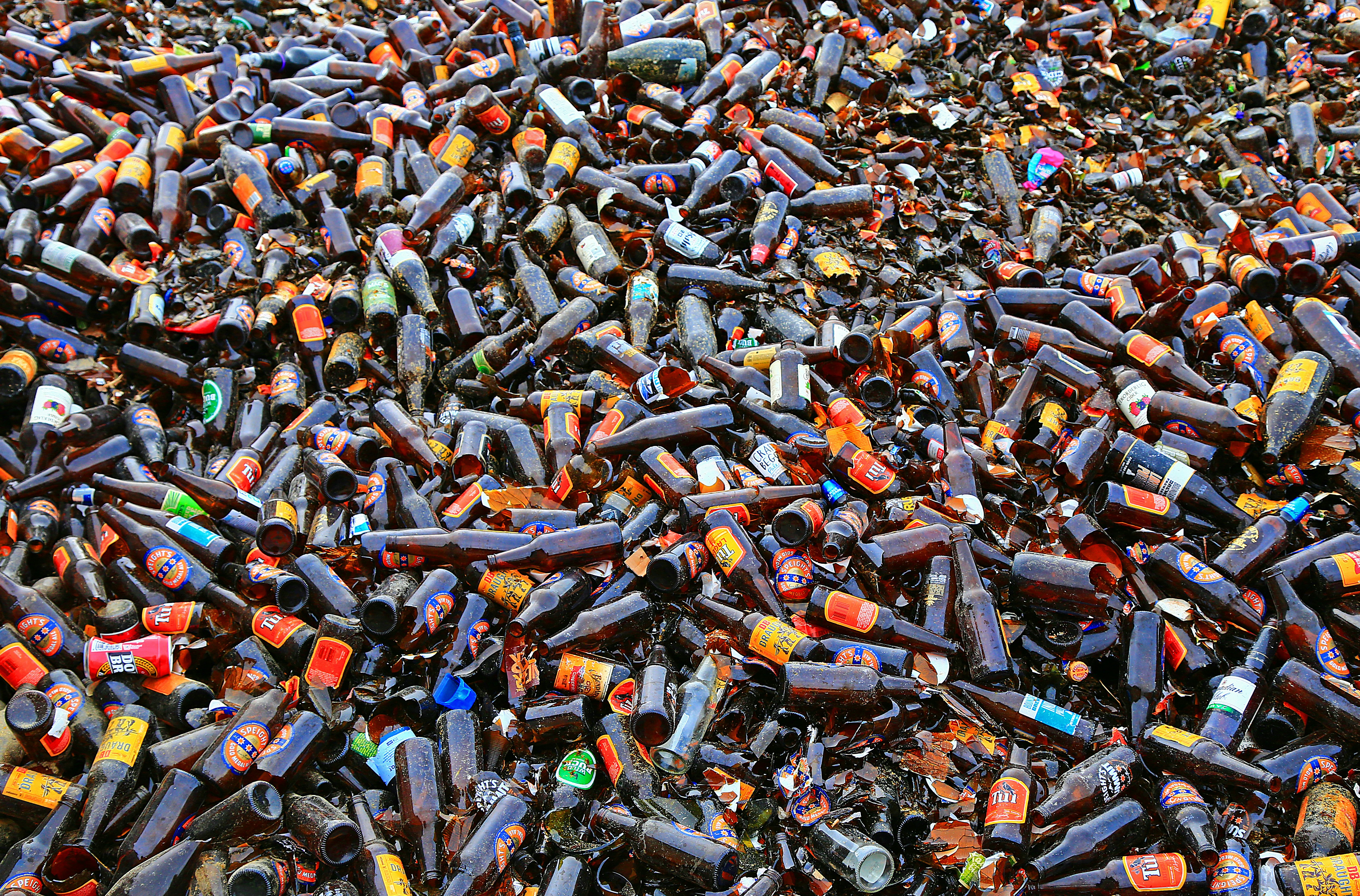 brown and black cigarette butts on the ground